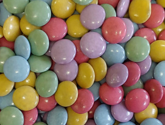 Schokolinsen in Einzelfarben wie türkis, orange, blau, grün, gelb, rot ... Schokolinsen in Einzelfarben wie türkis, orange, blau, grün, gelb, rot ...