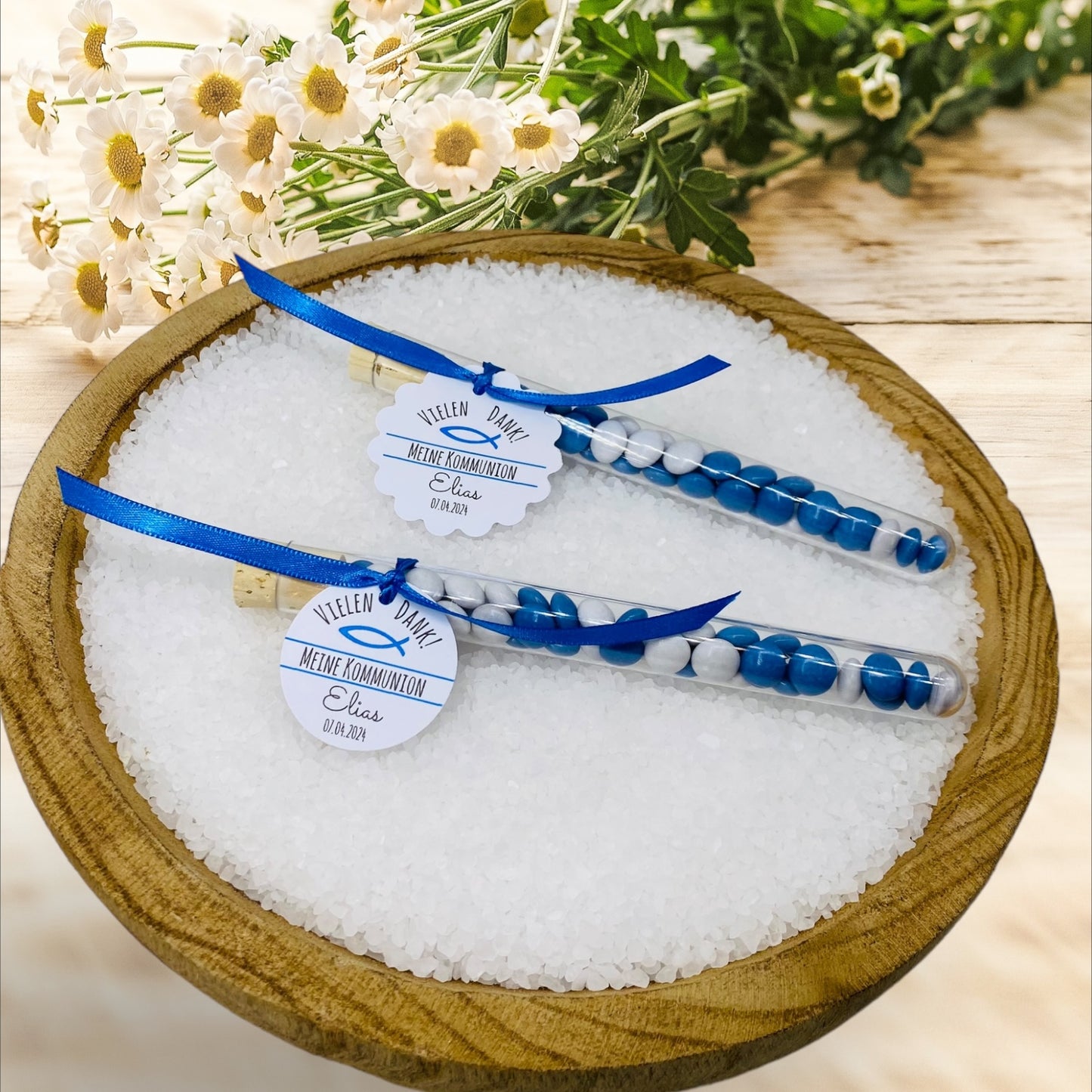 Elegant test tubes decorated with a church fish as a guest gift