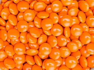 Chokoladelinser (100 g), assorterede, enkeltfarvede, orange (som Smarties)